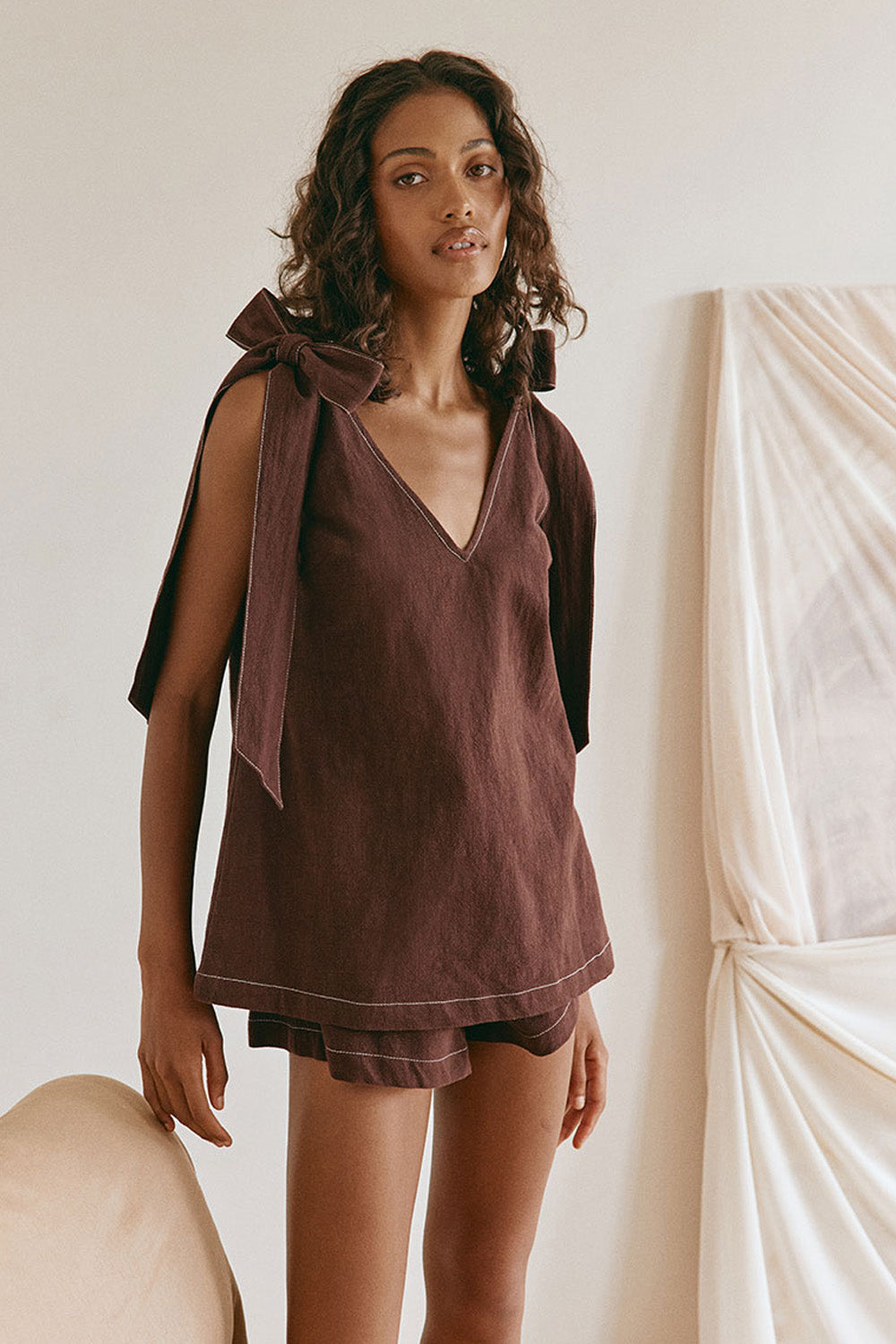 67 Elixir Chocolate Brown Bow V Neck Elixir Top – Stores